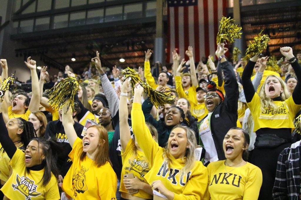Norse students cheering at a Northern Kentucky University men's basketball game.
