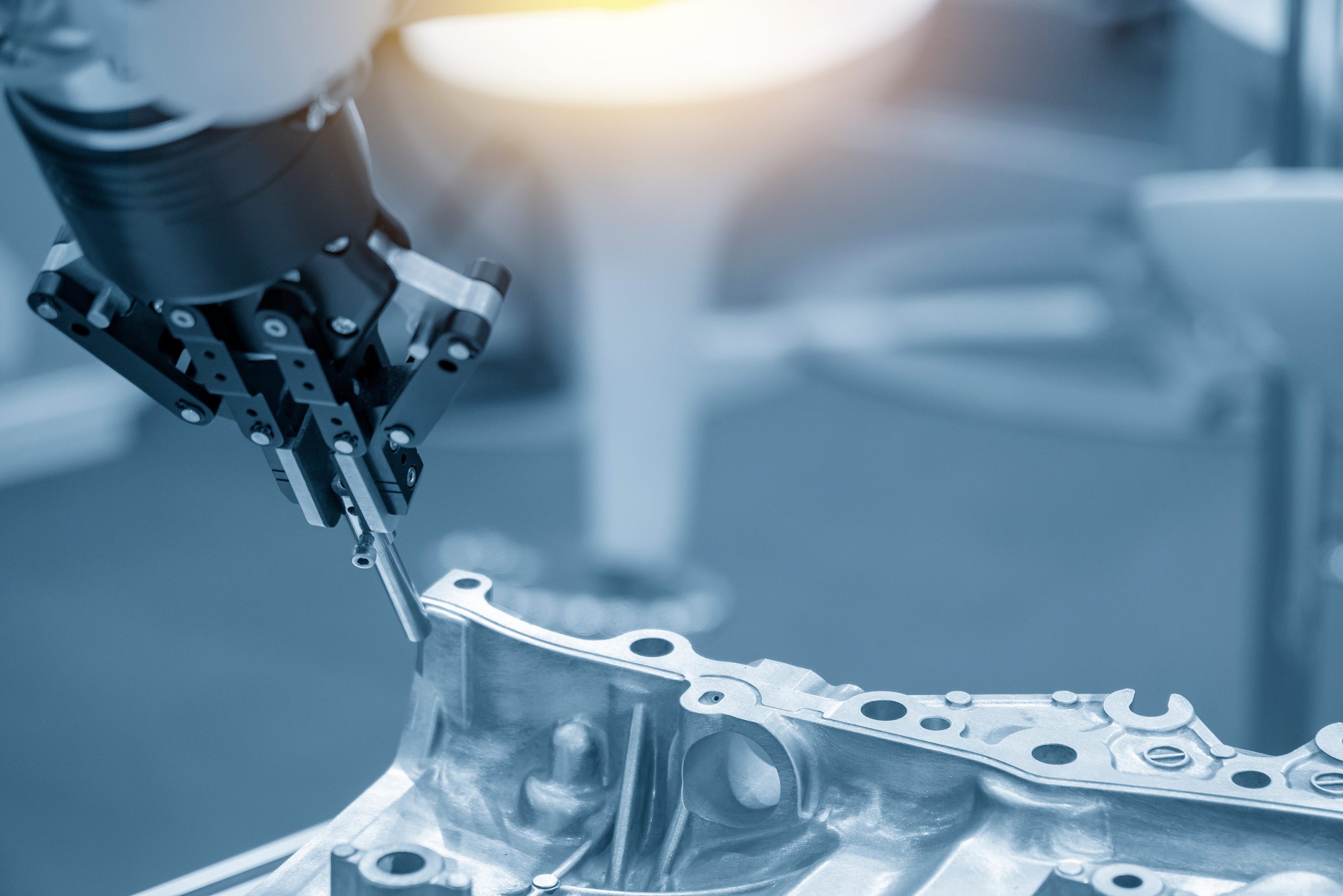 Automotive machine working on parts